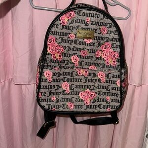 NWOT Juicy Couture Pink Rose Print
Black Logo Faux Leather Backpack